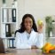african-american-female-dietitian-holding-apple-an-2025-03-18-18-20-56-utc.jpg