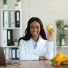 african-american-female-dietitian-holding-apple-an-2025-03-18-18-20-56-utc.jpg